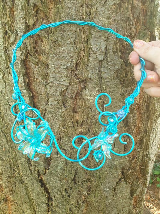 Collier Bleu Turquoise fleur et Papillon